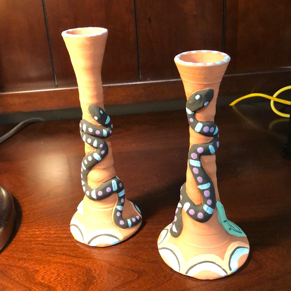 Terra-cotta folk art candle holders